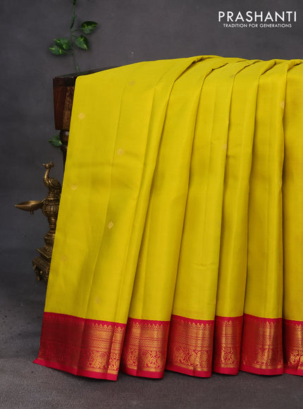 Pure kanchipuram silk saree yellow and pink with allover zari weaves & buttas and zari woven korvai border