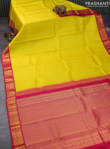 Pure kanchipuram silk saree yellow and pink with allover zari weaves & buttas and zari woven korvai border