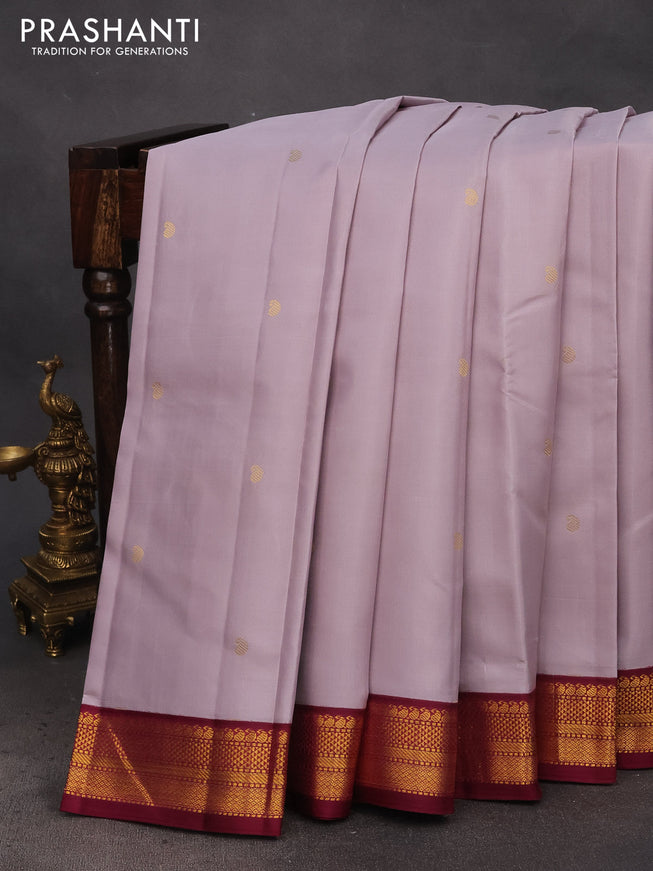 Pure kanchipuram silk saree pastel lavender and dark magenta pink with zari woven buttas and zari woven korvai border