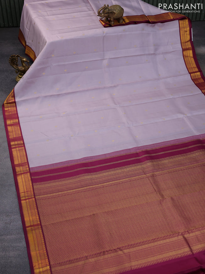 Pure kanchipuram silk saree pastel lavender and dark magenta pink with zari woven buttas and zari woven korvai border