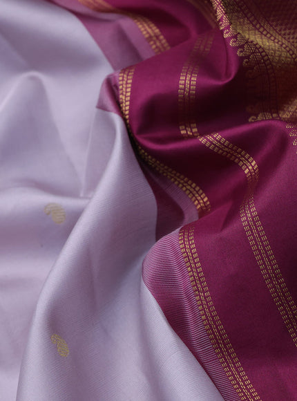 Pure kanchipuram silk saree pastel lavender and dark magenta pink with zari woven buttas and zari woven korvai border