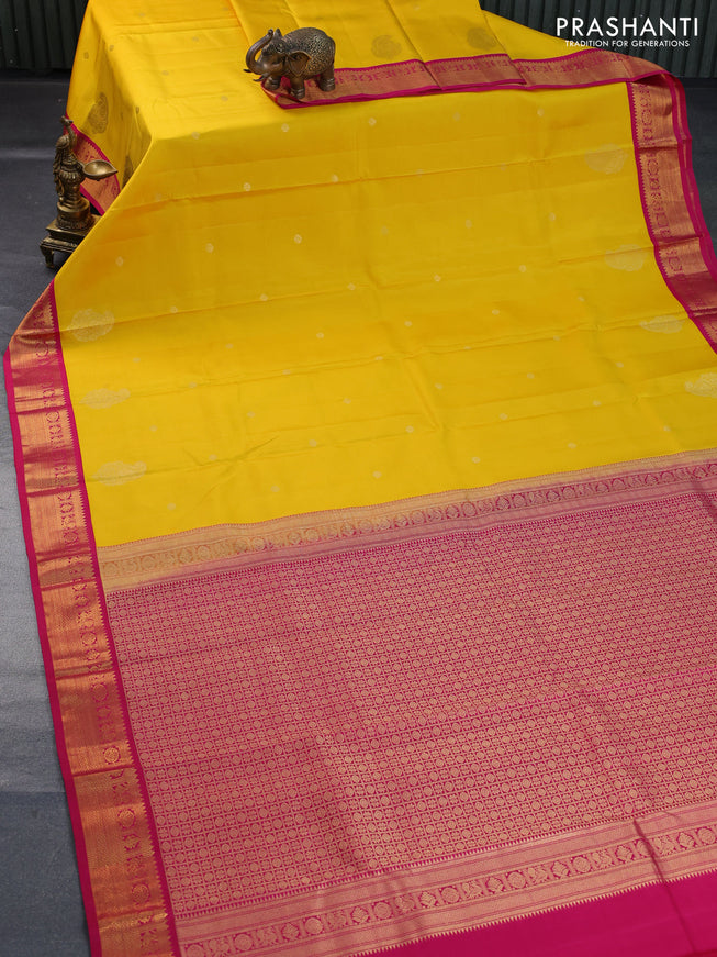 Pure kanchipuram silk saree mango yellow and pink with zari woven buttas and zari woven korvai border