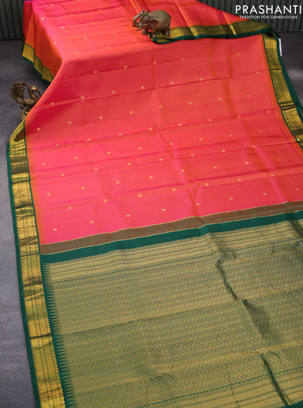 Pure kanchipuram silk saree dual shade of pinkish orange and green with zari woven buttas and temple design zari woven korvai border