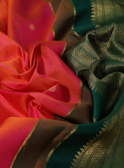 Pure kanchipuram silk saree dual shade of pinkish orange and green with zari woven buttas and temple design zari woven korvai border