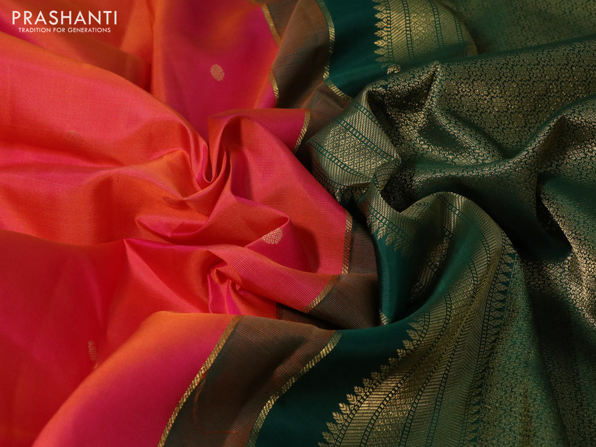 Pure kanchipuram silk saree dual shade of pinkish orange and green with zari woven buttas and temple design zari woven korvai border