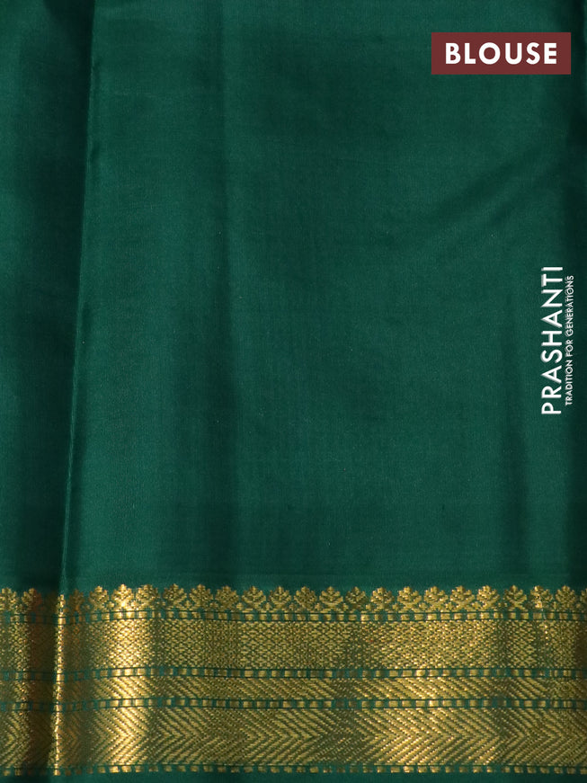 Pure kanchipuram silk saree dual shade of pinkish orange and green with zari woven buttas and temple design zari woven korvai border