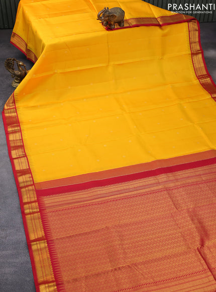 Pure kanchipuram silk saree mango yellow and red with zari woven buttas and temple design zari woven korvai border