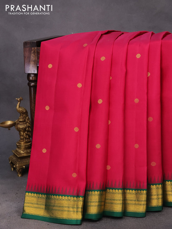 Pure kanchipuram silk saree magenta pink and green with zari woven buttas and temple design zari woven korvai border