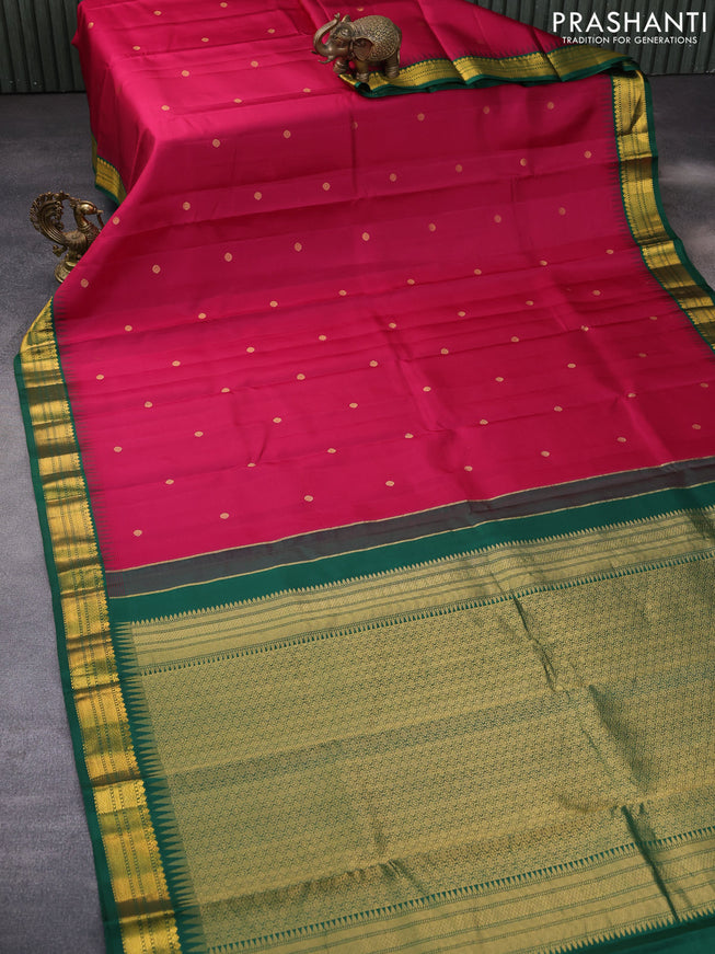 Pure kanchipuram silk saree magenta pink and green with zari woven buttas and temple design zari woven korvai border