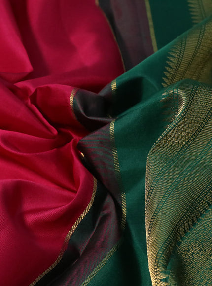 Pure kanchipuram silk saree magenta pink and green with zari woven buttas and temple design zari woven korvai border