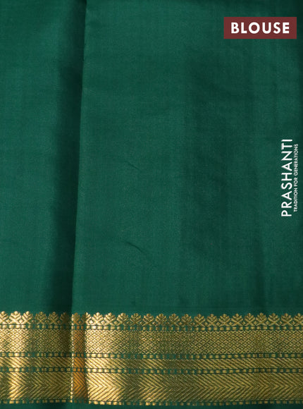 Pure kanchipuram silk saree magenta pink and green with zari woven buttas and temple design zari woven korvai border