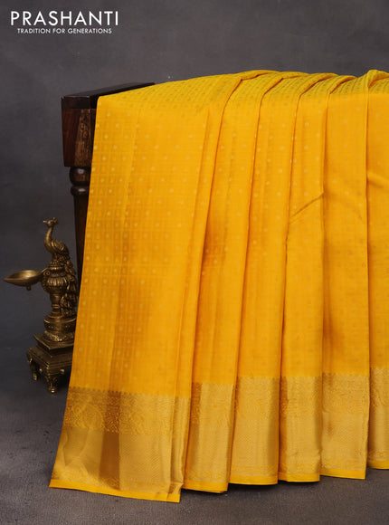 Pure kanchipuram silk saree mango yellow and pink with allover self emboss & zari buttas and zari woven border