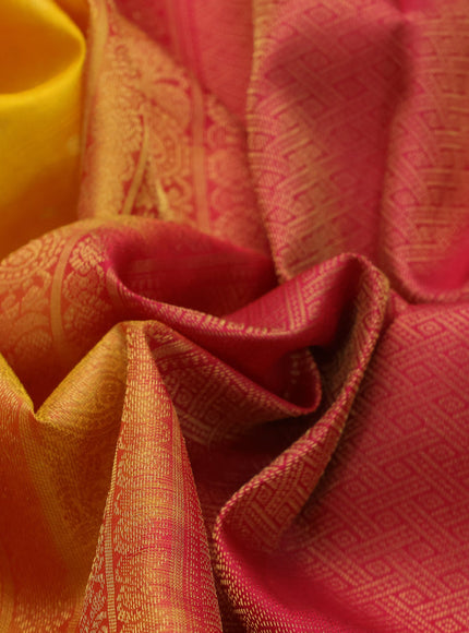 Pure kanchipuram silk saree mango yellow and pink with allover self emboss & zari buttas and zari woven border