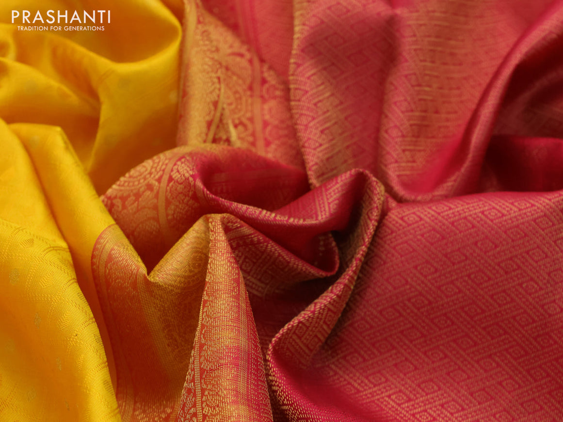 Pure kanchipuram silk saree mango yellow and pink with allover self emboss & zari buttas and zari woven border