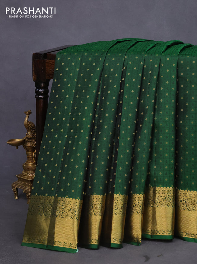 Pure kanchipuram silk saree bottle green and pink with allover self emboss & zari buttas and zari woven border