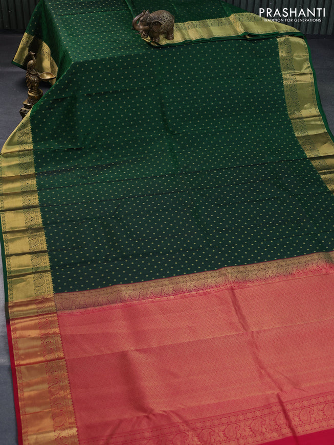 Pure kanchipuram silk saree bottle green and pink with allover self emboss & zari buttas and zari woven border