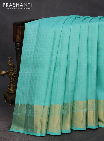 Pure kanchipuram silk saree teal blue and pink with allover self emboss & zari buttas and zari woven border