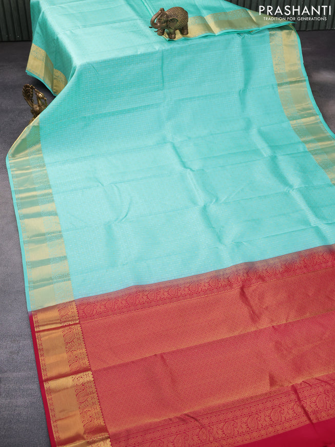 Pure kanchipuram silk saree teal blue and pink with allover self emboss & zari buttas and zari woven border