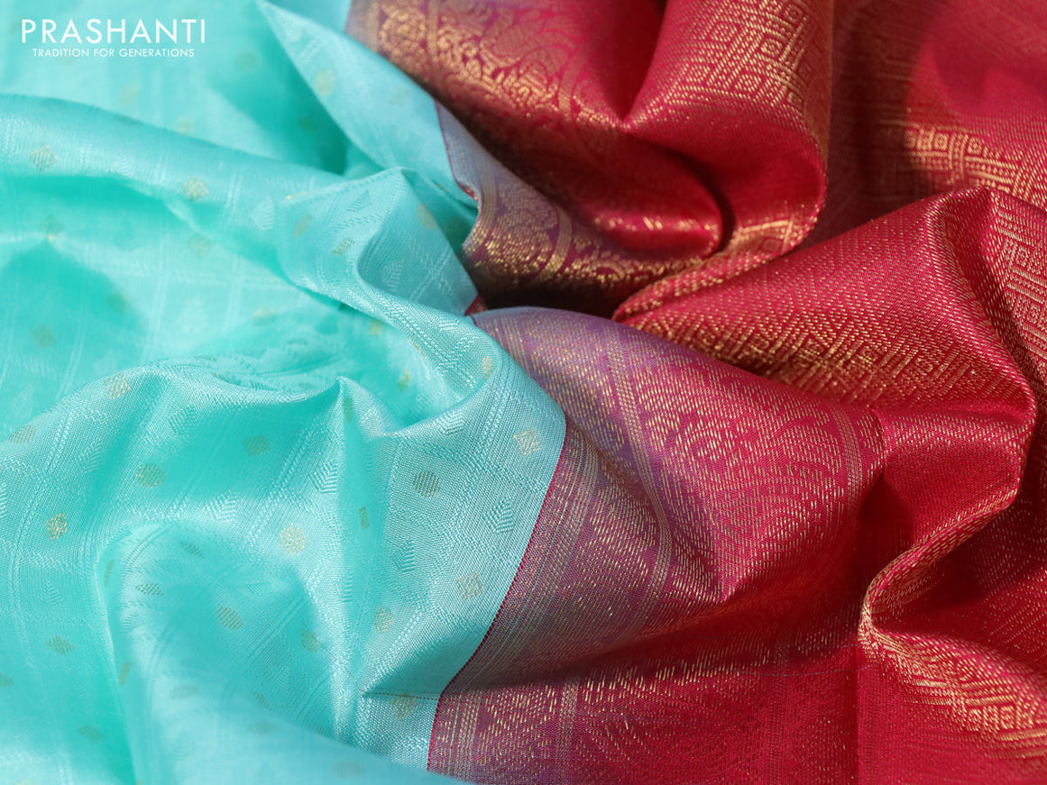 Pure kanchipuram silk saree teal blue and pink with allover self emboss & zari buttas and zari woven border