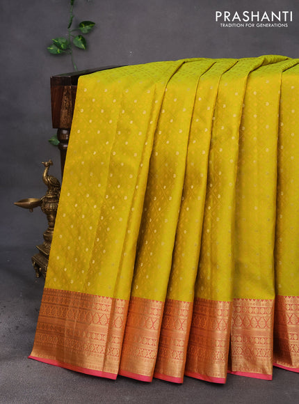 Pure kanchipuram silk saree lime yellow and pink with allover self emboss & zari buttas and zari woven border