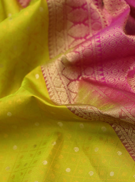 Pure kanchipuram silk saree lime yellow and pink with allover self emboss & zari buttas and zari woven border