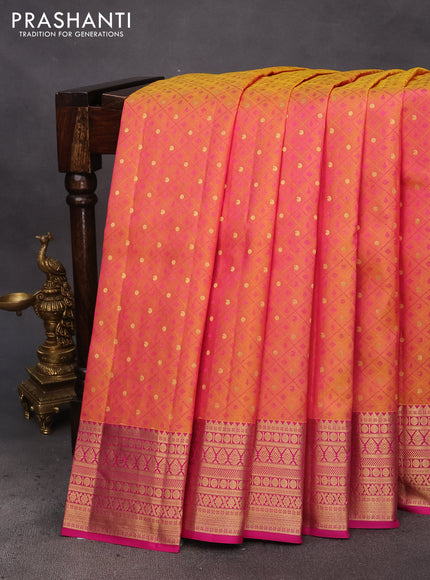 Pure kanchipuram silk saree dual shade of yellowish pink and pink with allover self emboss & zari buttas and zari woven border