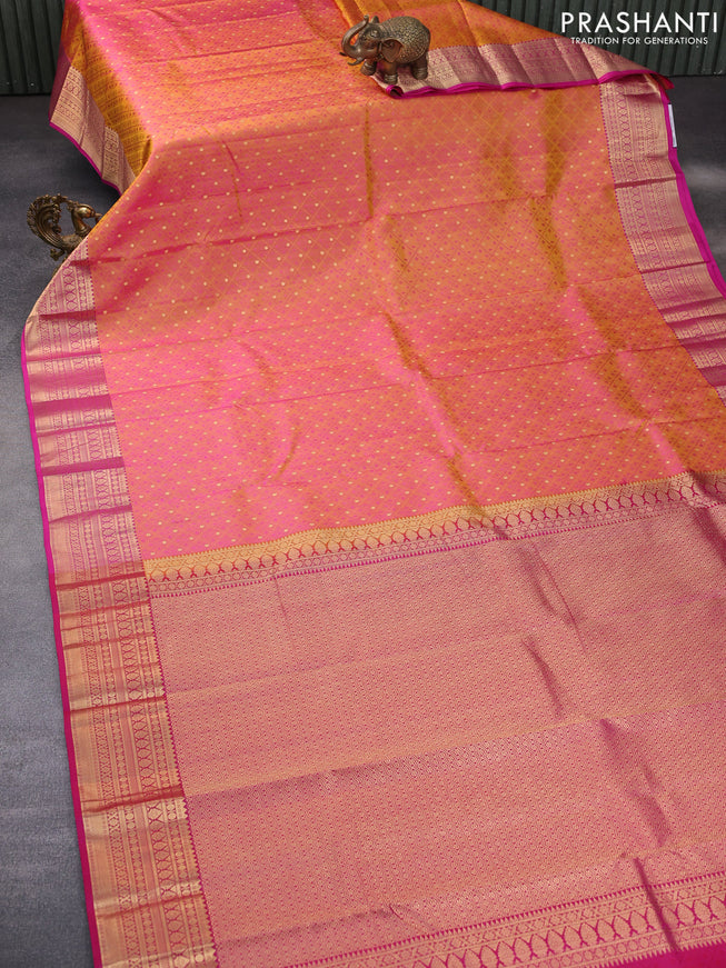 Pure kanchipuram silk saree dual shade of yellowish pink and pink with allover self emboss & zari buttas and zari woven border