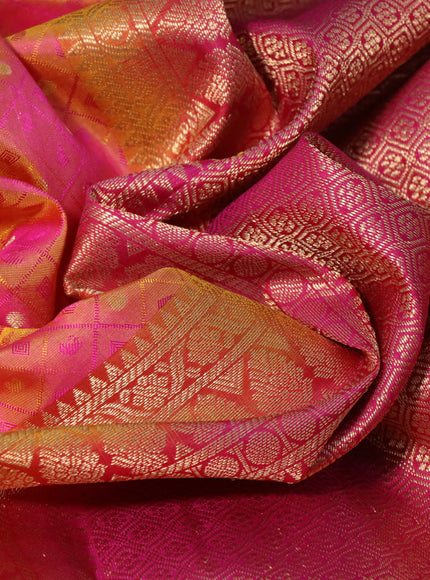 Pure kanchipuram silk saree dual shade of yellowish pink and pink with allover self emboss & zari buttas and zari woven border