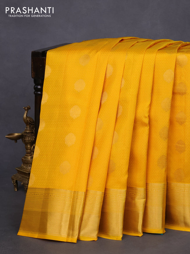 Pure kanchipuram silk saree mango yellow and teal green with allover self emboss & zari buttas and zari woven border