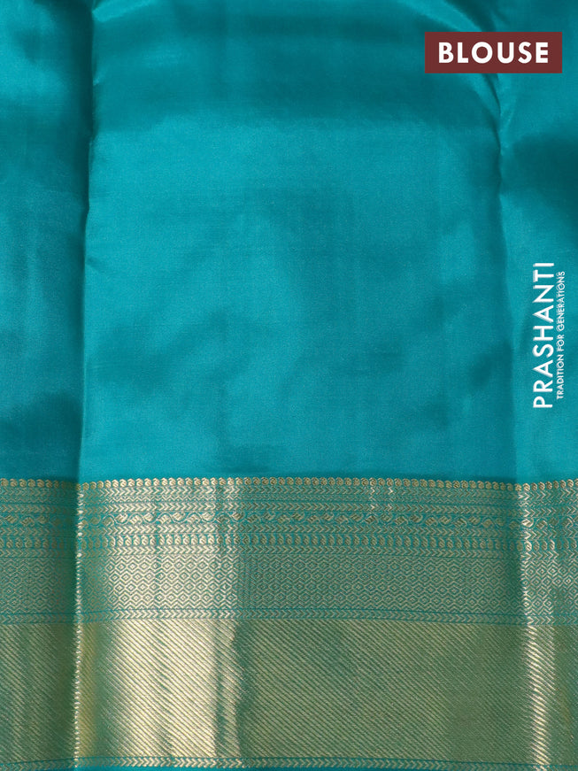 Pure kanchipuram silk saree mango yellow and teal green with allover self emboss & zari buttas and zari woven border