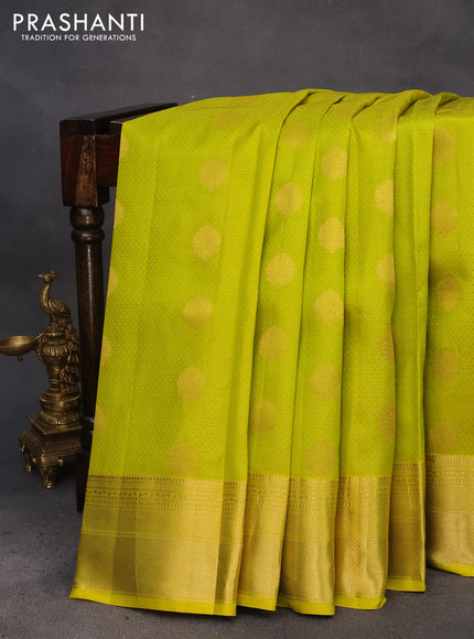 Pure kanchipuram silk saree lime yellow and teal green with allover self emboss & zari buttas and zari woven border