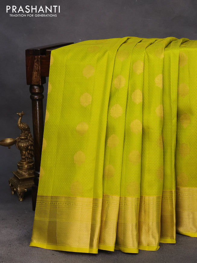 Pure kanchipuram silk saree lime yellow and teal green with allover self emboss & zari buttas and zari woven border