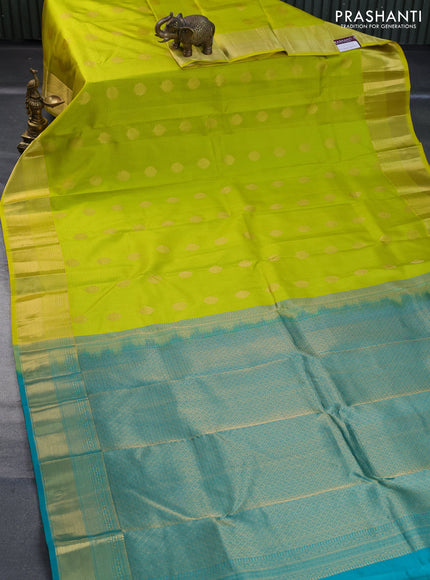 Pure kanchipuram silk saree lime yellow and teal green with allover self emboss & zari buttas and zari woven border