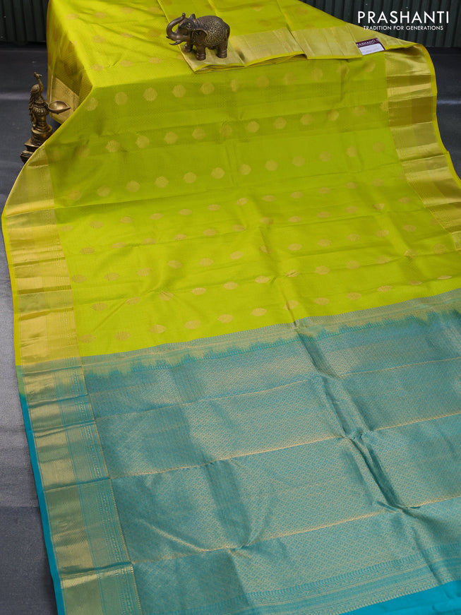 Pure kanchipuram silk saree lime yellow and teal green with allover self emboss & zari buttas and zari woven border