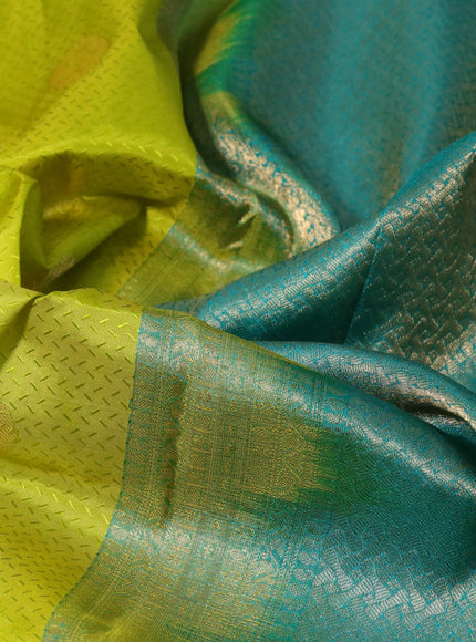 Pure kanchipuram silk saree lime yellow and teal green with allover self emboss & zari buttas and zari woven border