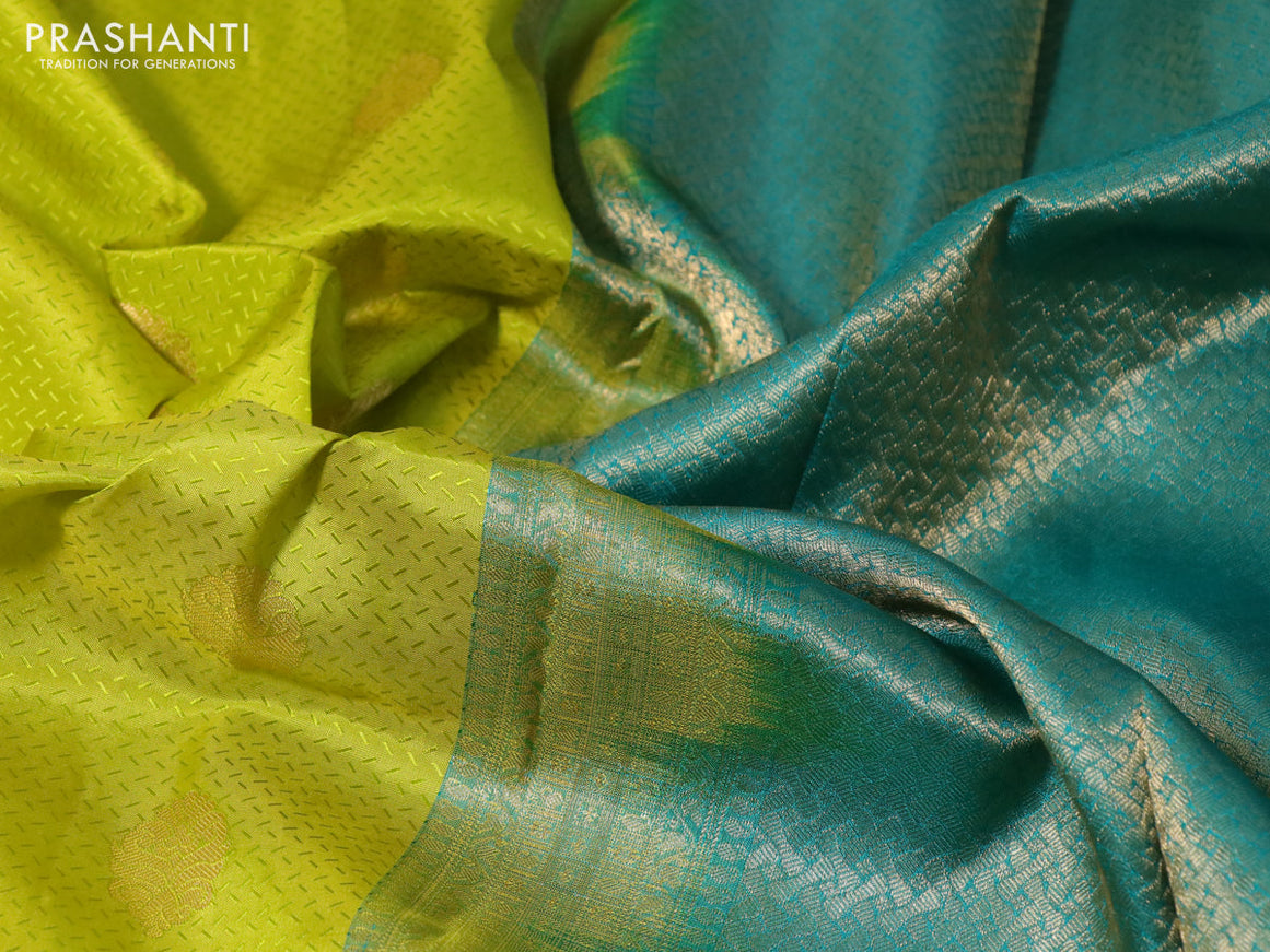 Pure kanchipuram silk saree lime yellow and teal green with allover self emboss & zari buttas and zari woven border