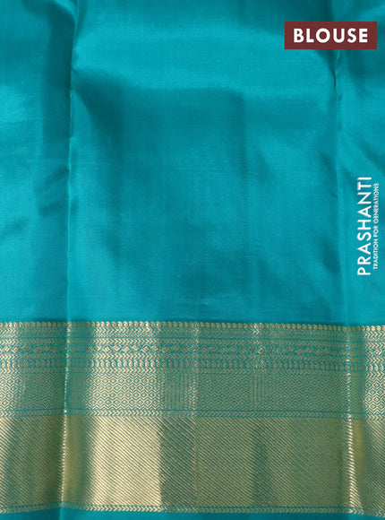 Pure kanchipuram silk saree lime yellow and teal green with allover self emboss & zari buttas and zari woven border