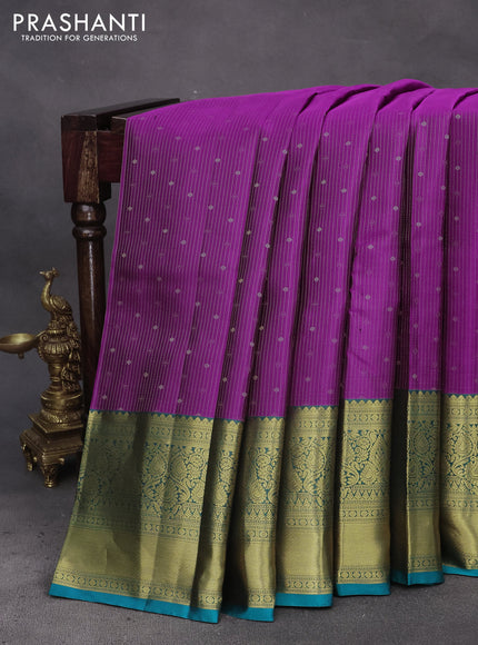 Pure kanchipuram silk saree purple and teal blue with allover zari weaves and long zari woven border