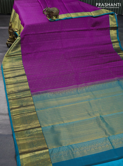 Pure kanchipuram silk saree purple and teal blue with allover zari weaves and long zari woven border