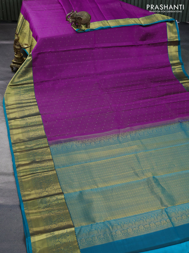 Pure kanchipuram silk saree purple and teal blue with allover zari weaves and long zari woven border