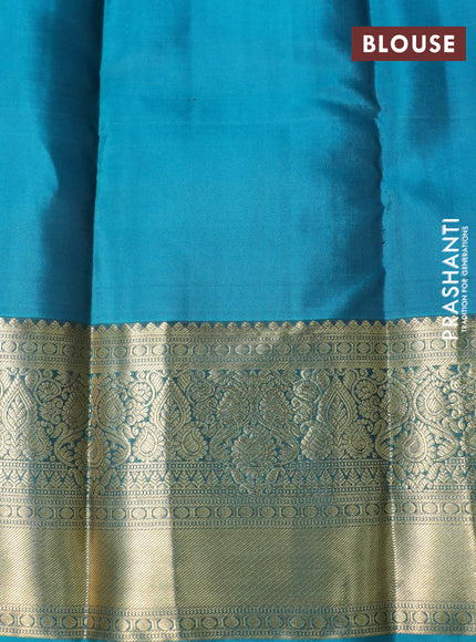 Pure kanchipuram silk saree purple and teal blue with allover zari weaves and long zari woven border