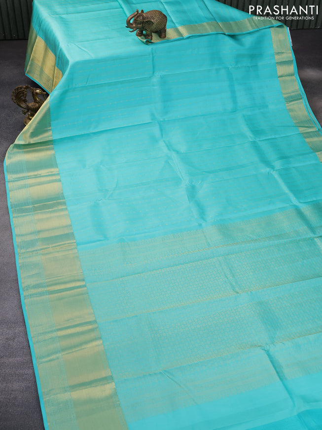 Pure kanchipuram silk saree teal blue with allover zari weaves and long zari woven border