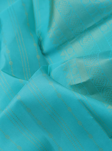 Pure kanchipuram silk saree teal blue with allover zari weaves and long zari woven border