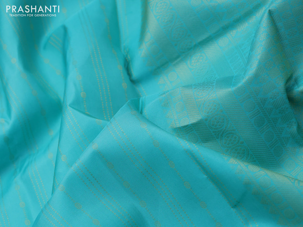 Pure kanchipuram silk saree teal blue with allover zari weaves and long zari woven border