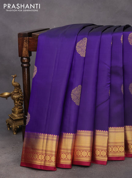 Pure kanchipuram silk saree blue and dark magenta pink with zari woven buttas and zari woven border