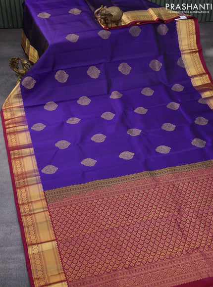 Pure kanchipuram silk saree blue and dark magenta pink with zari woven buttas and zari woven border