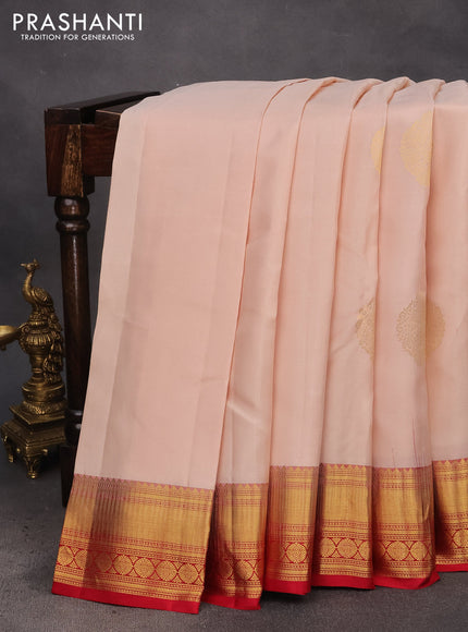 Pure kanchipuram silk saree peach shade and red with zari woven buttas and zari woven border