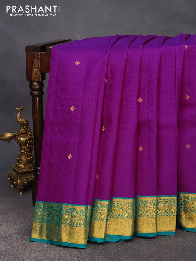 Pure kanchipuram silk saree purple and teal green with allover self emboss & buttas and zari woven korvai border