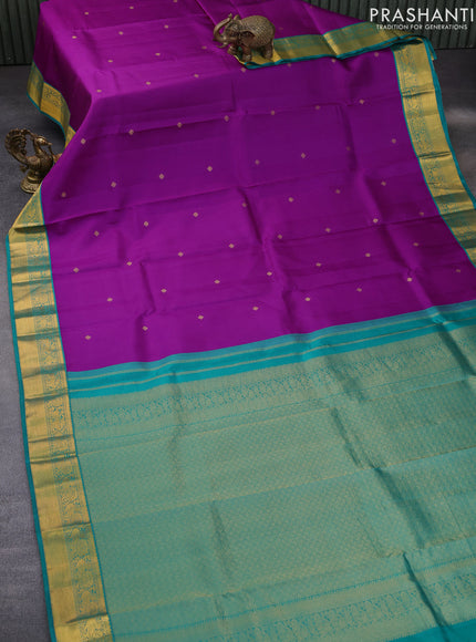 Pure kanchipuram silk saree purple and teal green with allover self emboss & buttas and zari woven korvai border