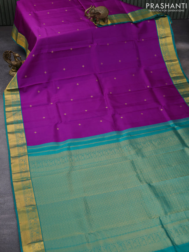 Pure kanchipuram silk saree purple and teal green with allover self emboss & buttas and zari woven korvai border